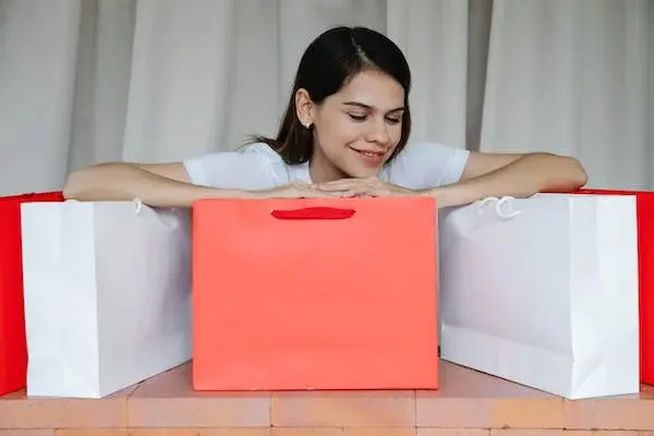 Woman cuddling package